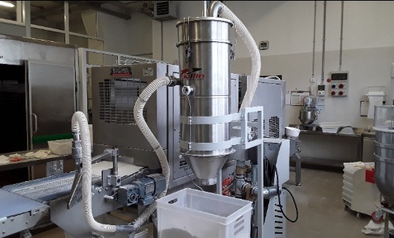 Pneumatisch transportsysteem voor de behandeling van voedselstof